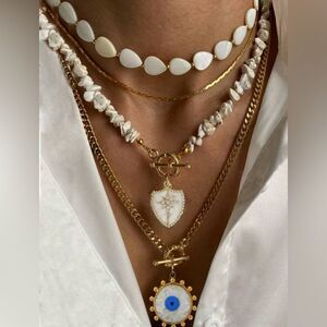Anthropologie White and Gold Evil Eye Necklace